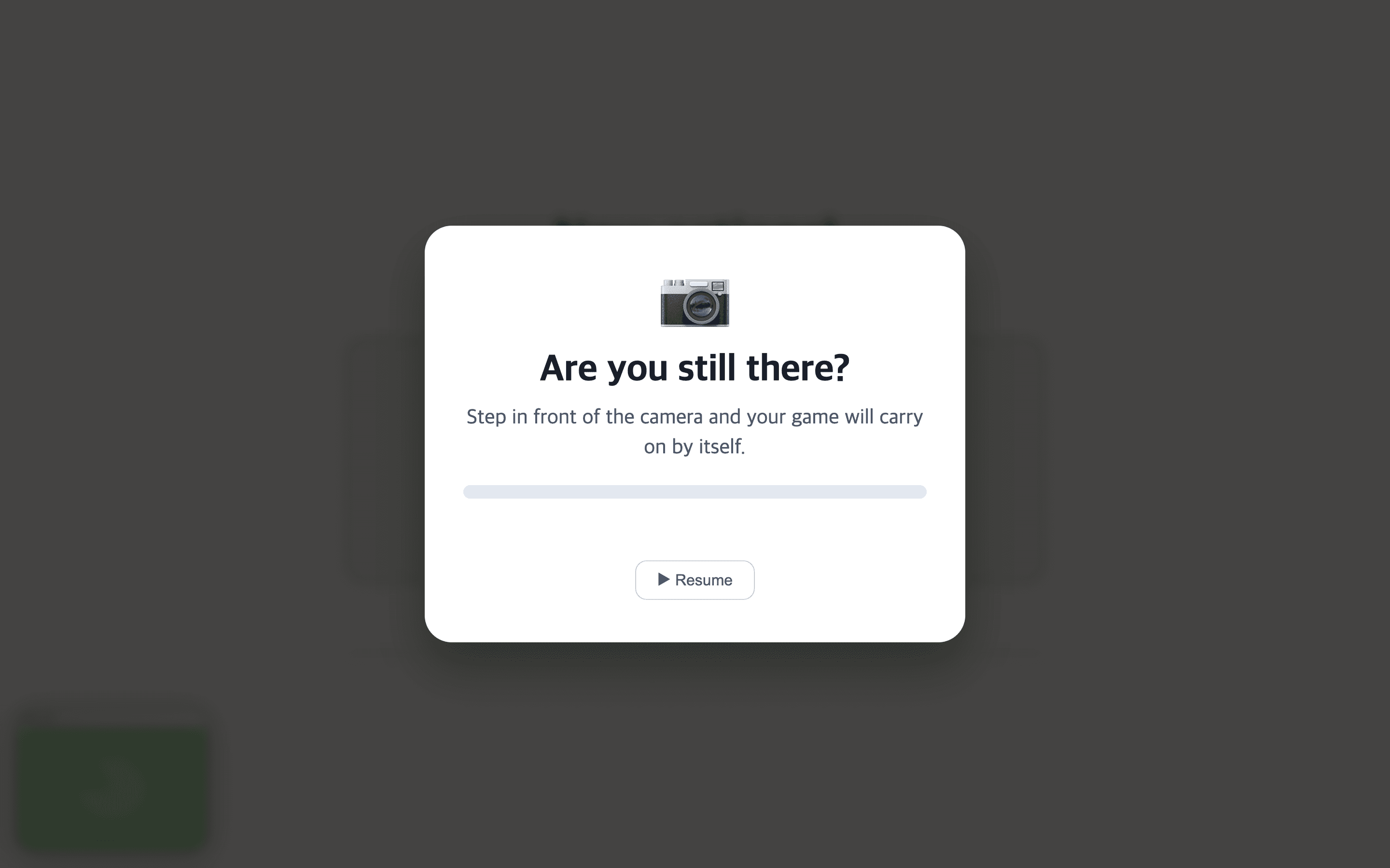 A paused game showing a card that reads 'Are you still there? Step in front of the camera and your game will carry on by itself.' with a progress bar and a small Resume button